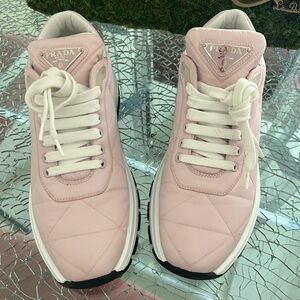 Brand new Prada women’s sneakers. Size 9.5. No box but new. Very comfortable.